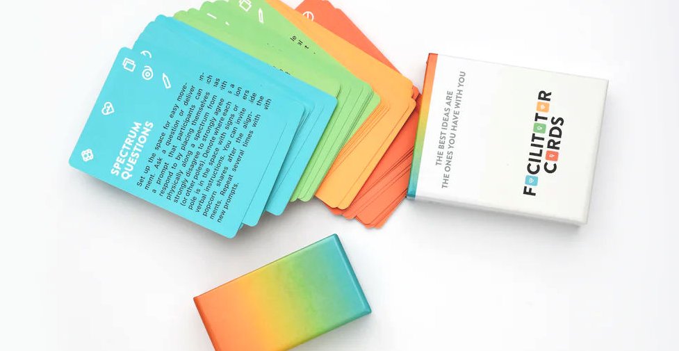 An open deck box with the old cards spilling out